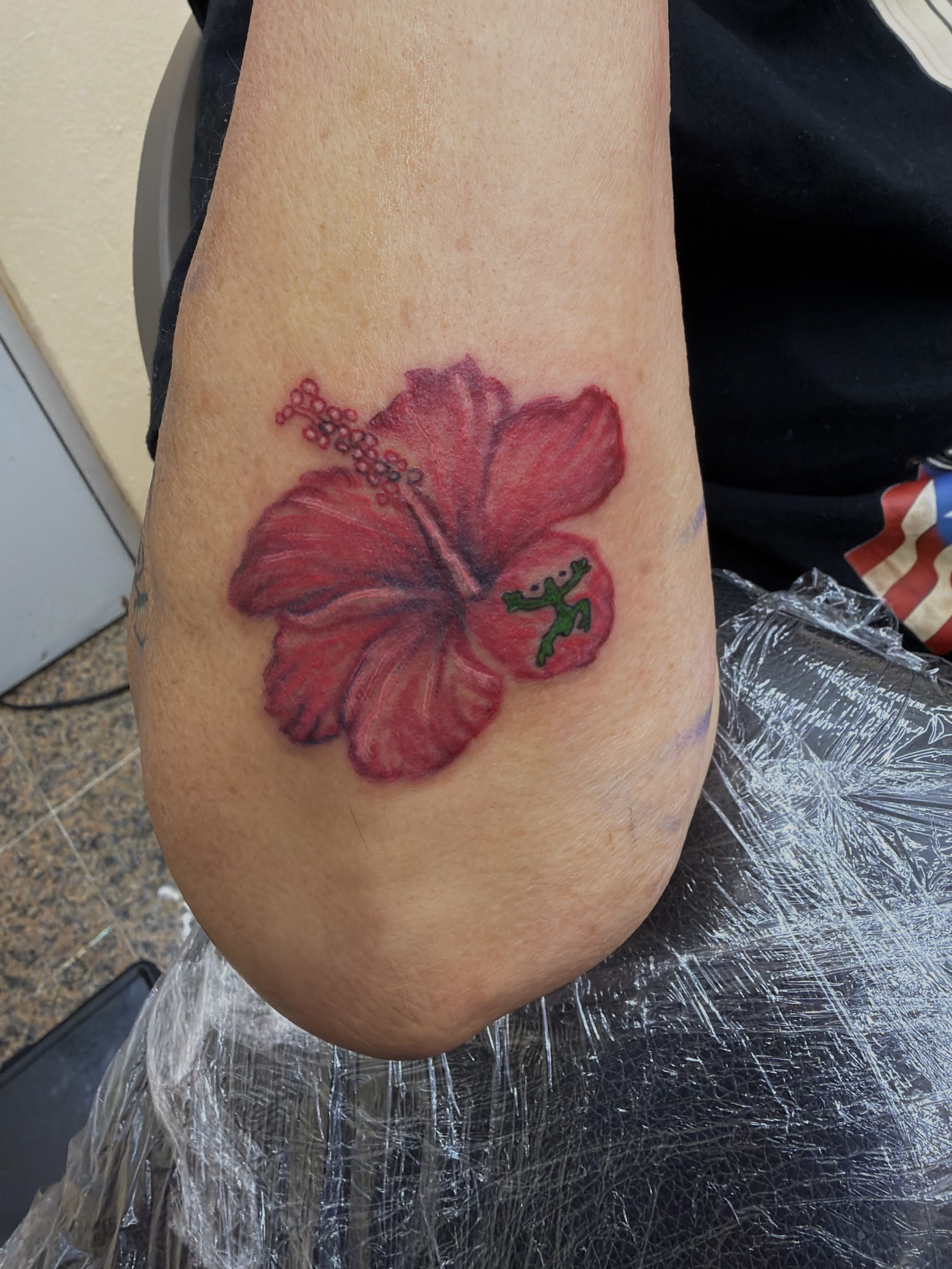 Hibiscus and coqui frog color tattoo by Angel J — AWJ Tattoos, Rio Grande Puerto Rico