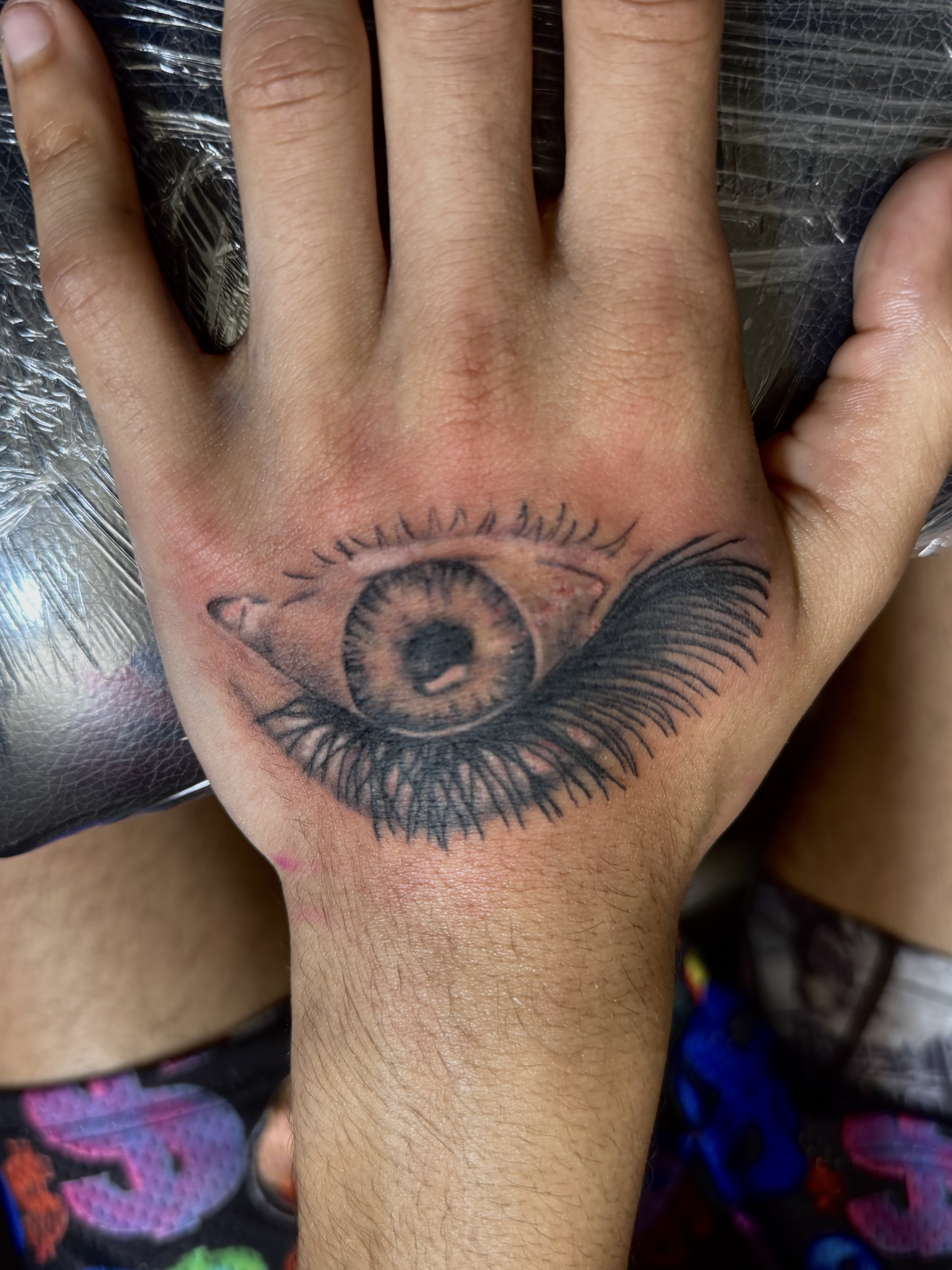 Realistic eye hand tattoo by Angel J — AWJ Tattoos, Rio Grande Puerto Rico